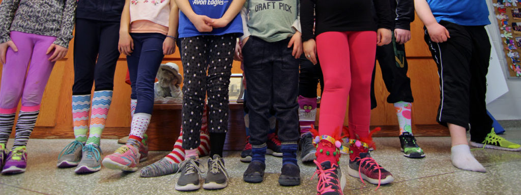 students with colourful socks