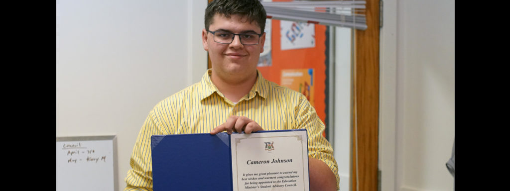 Cameron with certificate